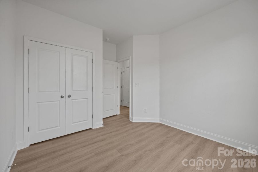 Spacious, unfurnished interior of a new home in The River District Townhomes, Charlotte (Image 20).