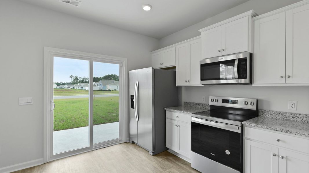 Representative furnished interior of a home built from the BRANDON by D.R. Horton in Hillcrest, Ravenel (Image 6).