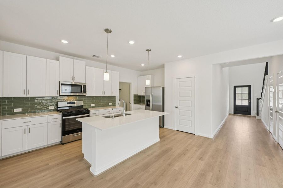 Furnished interior view inside a new home in Pine Lake Cove - Traditional Series, Montgomery (Image 11).