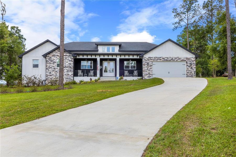 Front exterior of a new home in , Dade City, FL, highlighting curb appeal (Image 23).