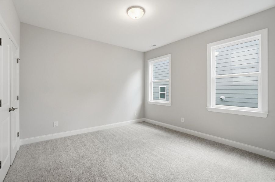 Spacious, unfurnished interior of a new home in Rone Creek, Waxhaw (Image 70).