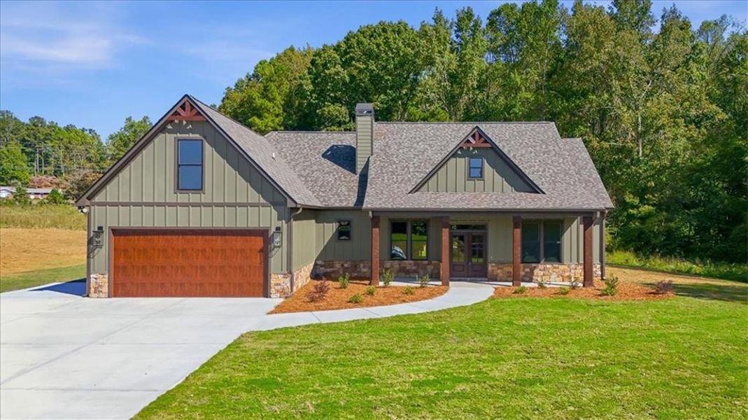 Front exterior of a new home in , Temple, GA, highlighting curb appeal (Image 1). Front exterior of a new home in , Temple, GA, highlighting curb appeal (Image 1).