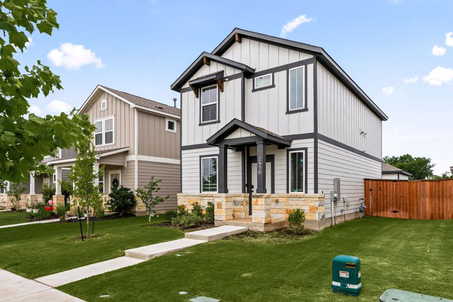Front exterior of a new home in , Round Rock, TX, highlighting curb appeal (Image 2). Front exterior of a new home in , Round Rock, TX, highlighting curb appeal (Image 2).