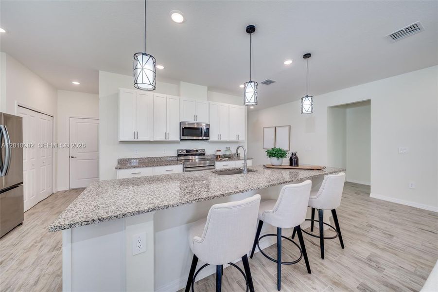 Furnished interior view inside a new home in , Port St. Lucie (Image 11).