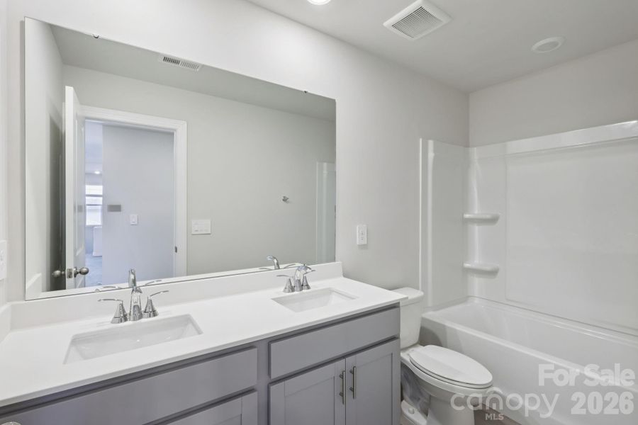 Furnished interior view inside a new home in Harper Landing, Stanley (Image 9).