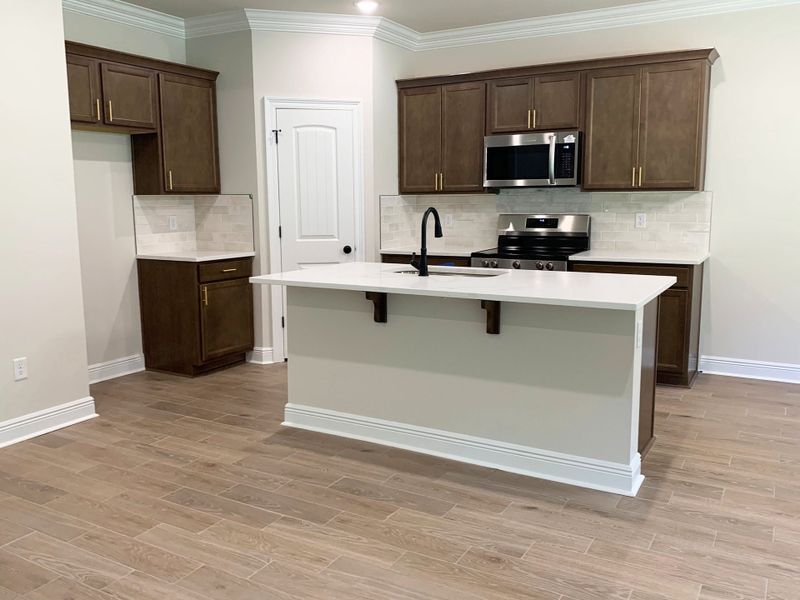 Furnished interior view inside a new home in Sentinel Ridge, Pace (Image 6).