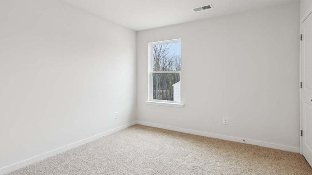 Spacious, unfurnished interior of a new home in Reedy Creek Preserve, Charlotte (Image 23).