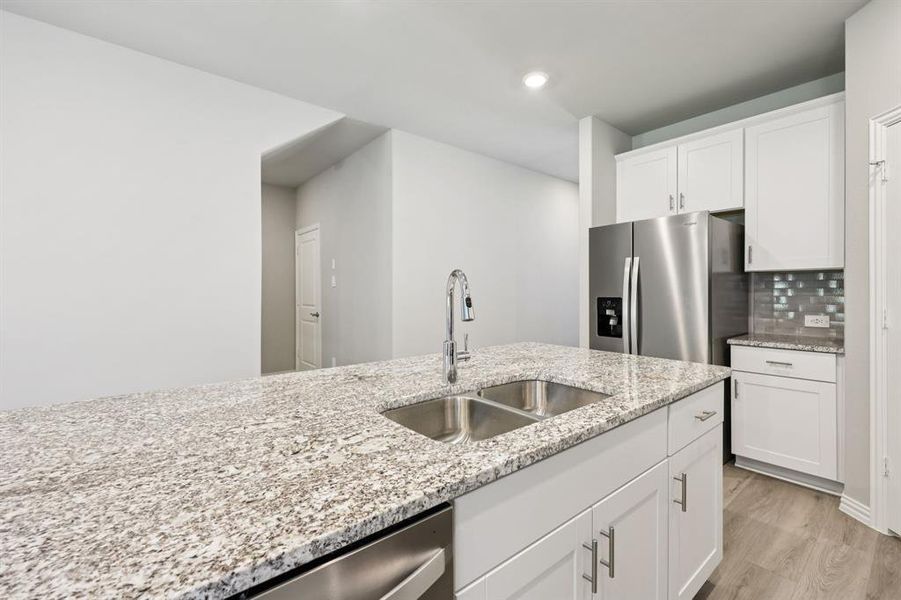 Furnished interior view inside a new home in Westmoor, Sherman (Image 6).