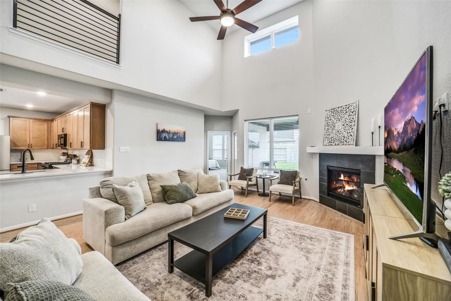 High ceilings offering a ton of natural light into the family room!