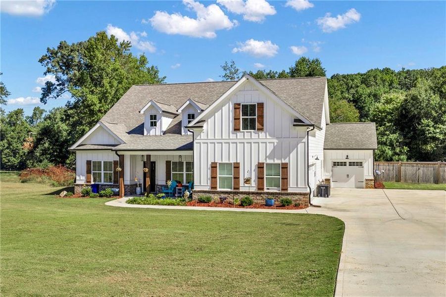 Front exterior of a new home in , Monroe, GA, highlighting curb appeal (Image 2). Front exterior of a new home in , Monroe, GA, highlighting curb appeal (Image 2).