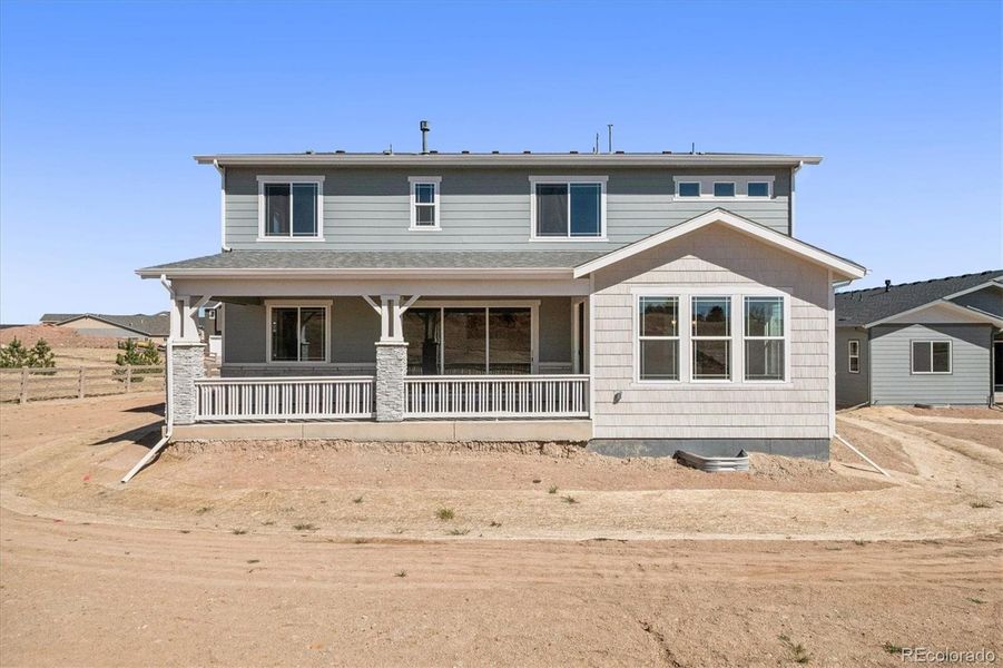 Exterior details and patio area of a home in Peakview at Ascent Village, Littleton (Image 26).