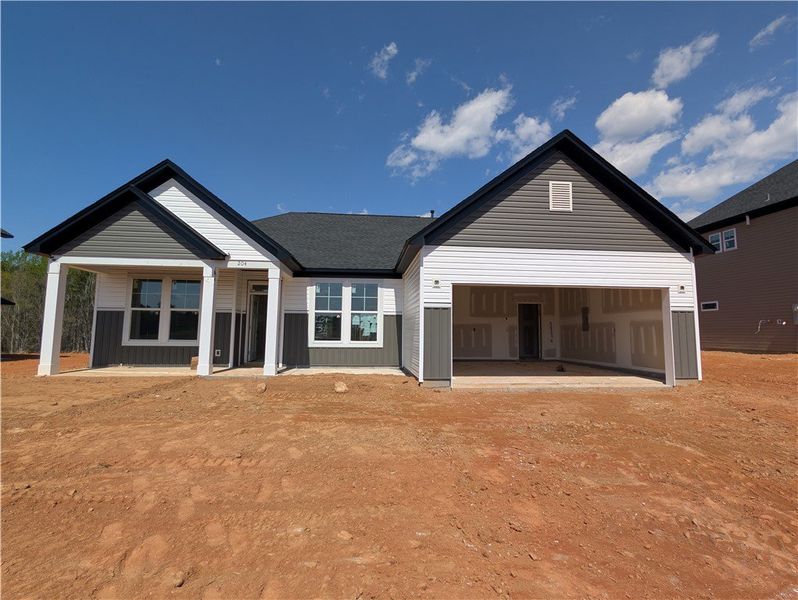 A newly constructed residence features a welcoming A newly constructed residence features a welcoming