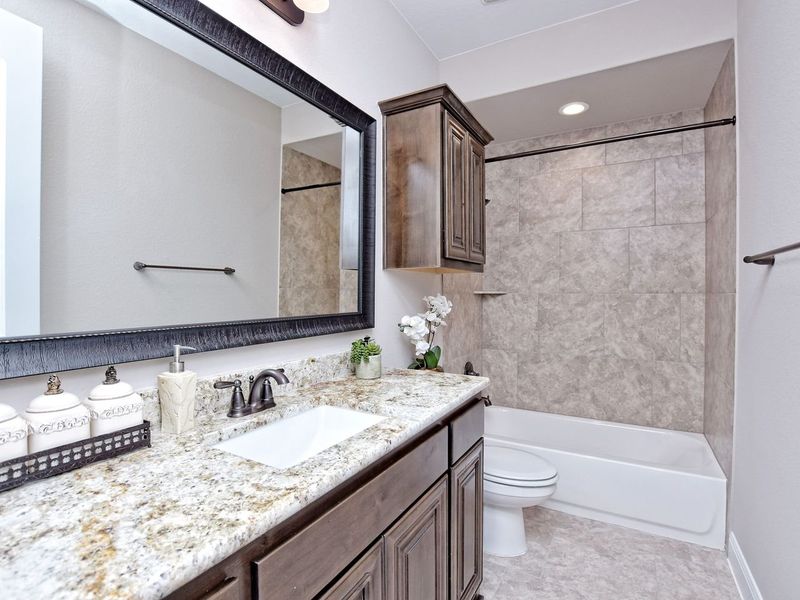 Representative furnished interior of a home built from the San Simeon I by Giddens Homes in Clearwater Ranch, Liberty Hill (Image 267).