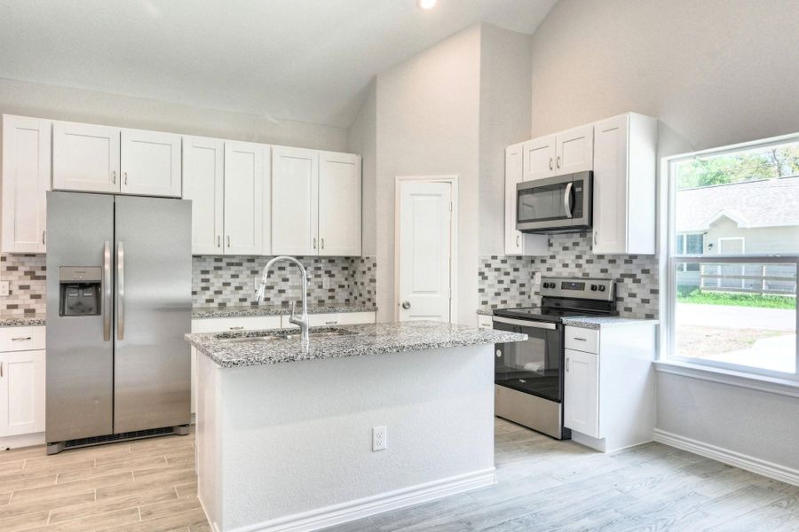 Furnished interior view inside a new home in , Willis (Image 3).