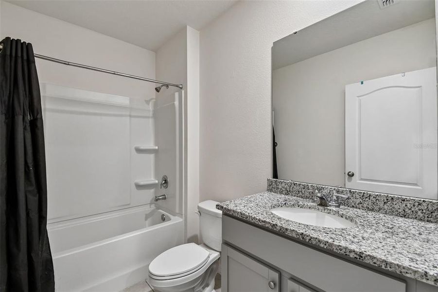 Furnished interior view inside a new home in Riviera Bella, Debary (Image 15).