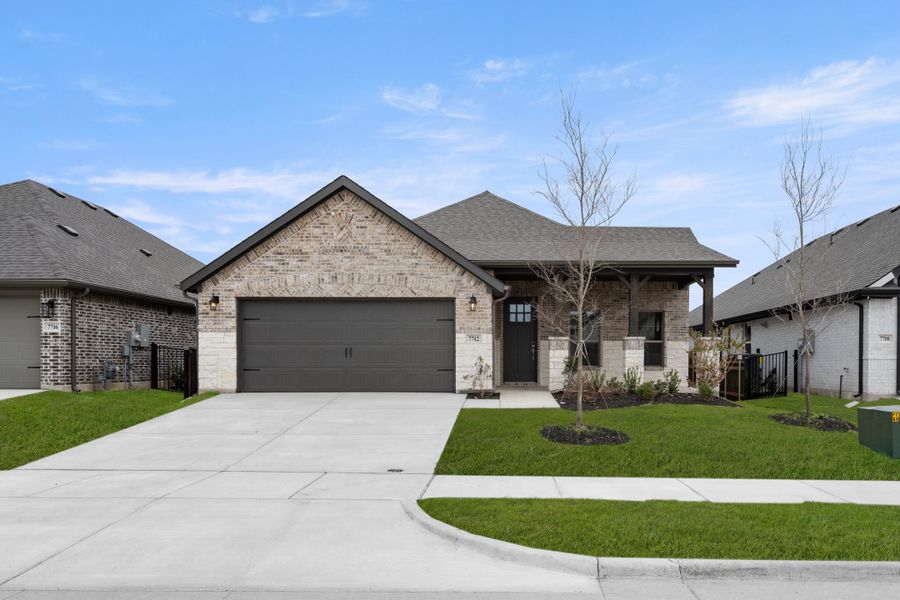 Front exterior of a new home in Silo Mills, Joshua, TX, highlighting curb appeal (Image 20).