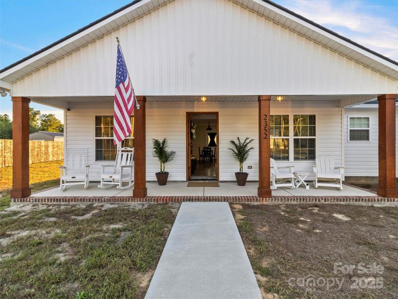 Front View / Front Porch, Complete with Rocking Chairs (that does convey with the sale)