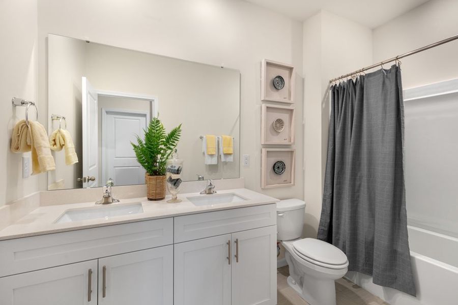 Representative furnished interior of a home built from the BOOTH by D.R. Horton in Gretchen Pines, West End (Image 14).