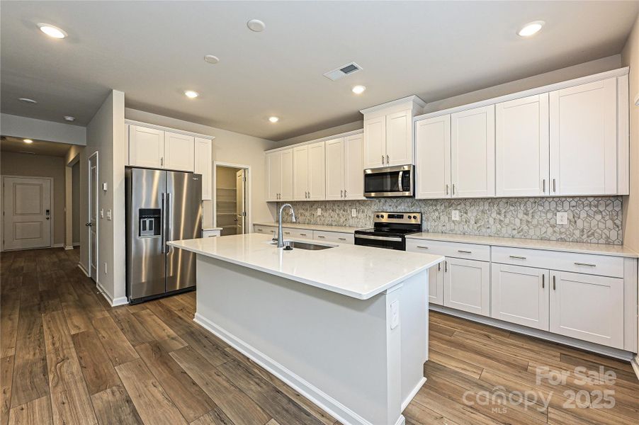 Furnished interior view inside a new home in Harper Landing, Stanley (Image 7).