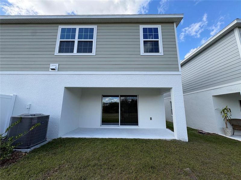 Exterior details and patio area of a home in Sky Lakes Towns, St. Cloud (Image 3).
