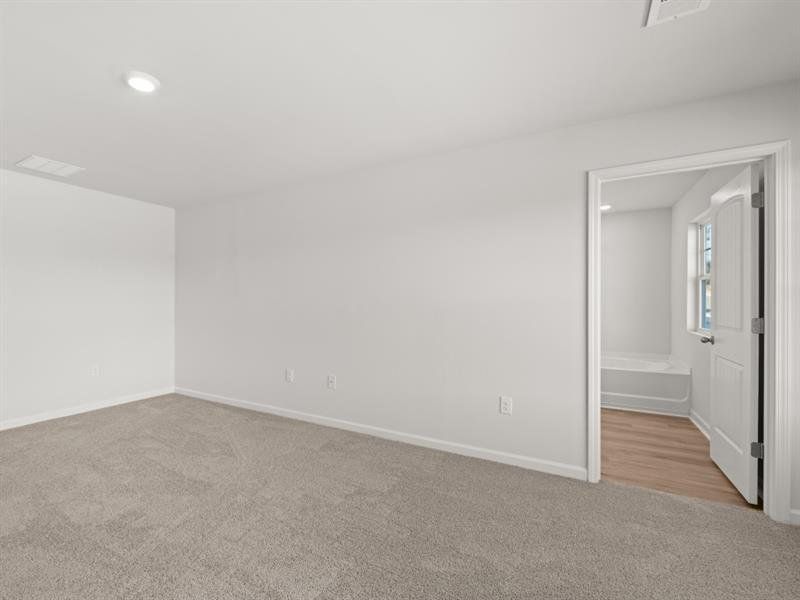Spacious, unfurnished interior of a new home in Waypoint, Flowery Branch (Image 15).