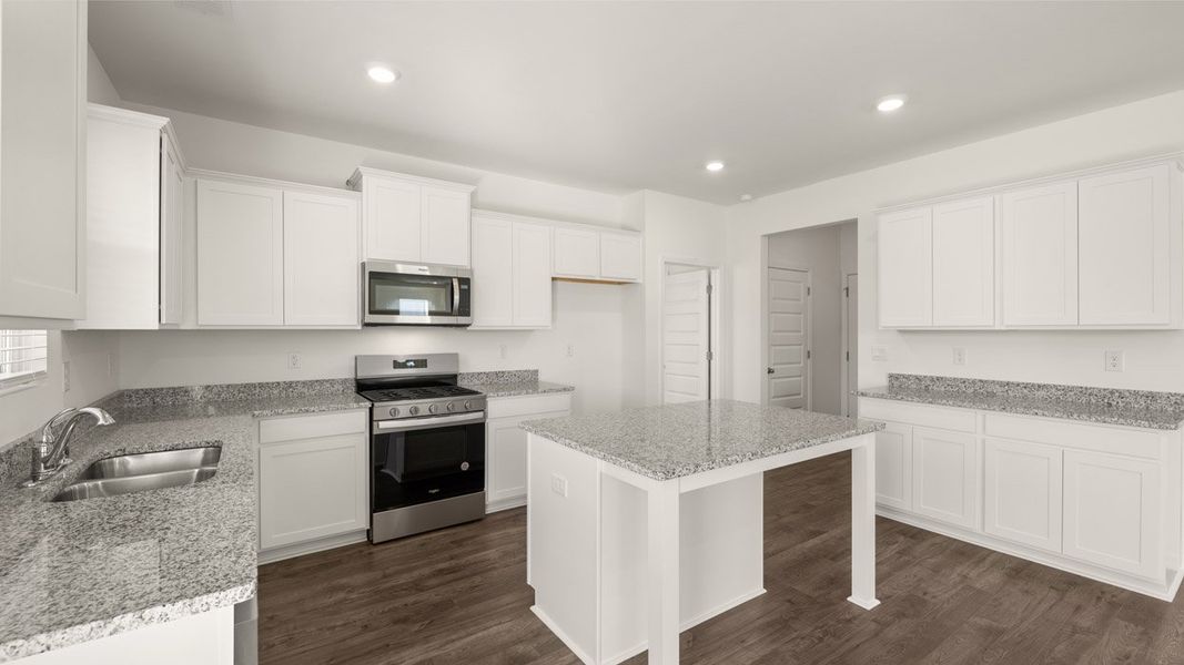 Representative furnished interior of a home built from the Mansfield by D.R. Horton in Brooks Station, Dacula (Image 7).
