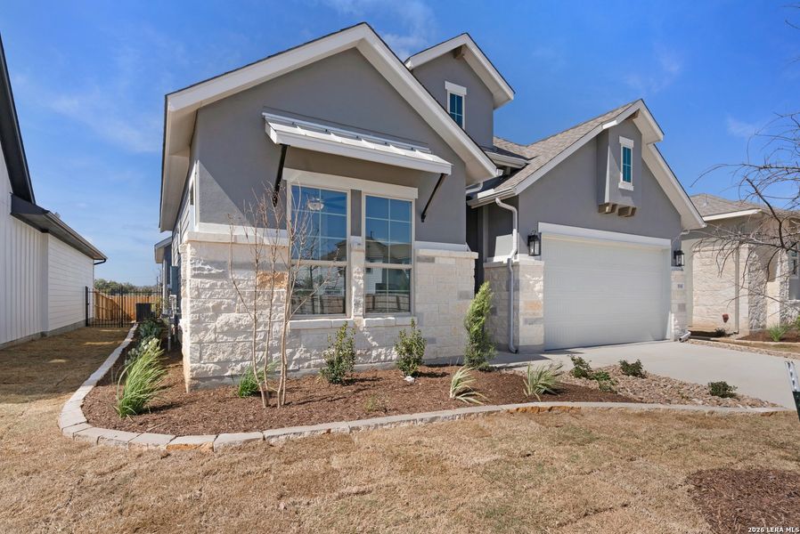 Front exterior of a new home in Davis Ranch, San Antonio, TX, highlighting curb appeal (Image 20).