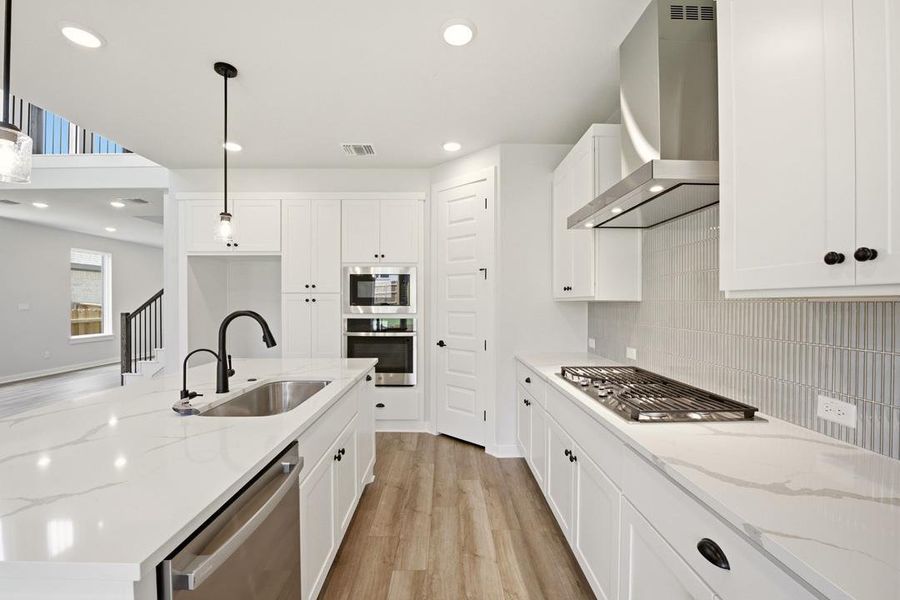 Furnished interior view inside a new home in Heritage, Dripping Springs (Image 6).