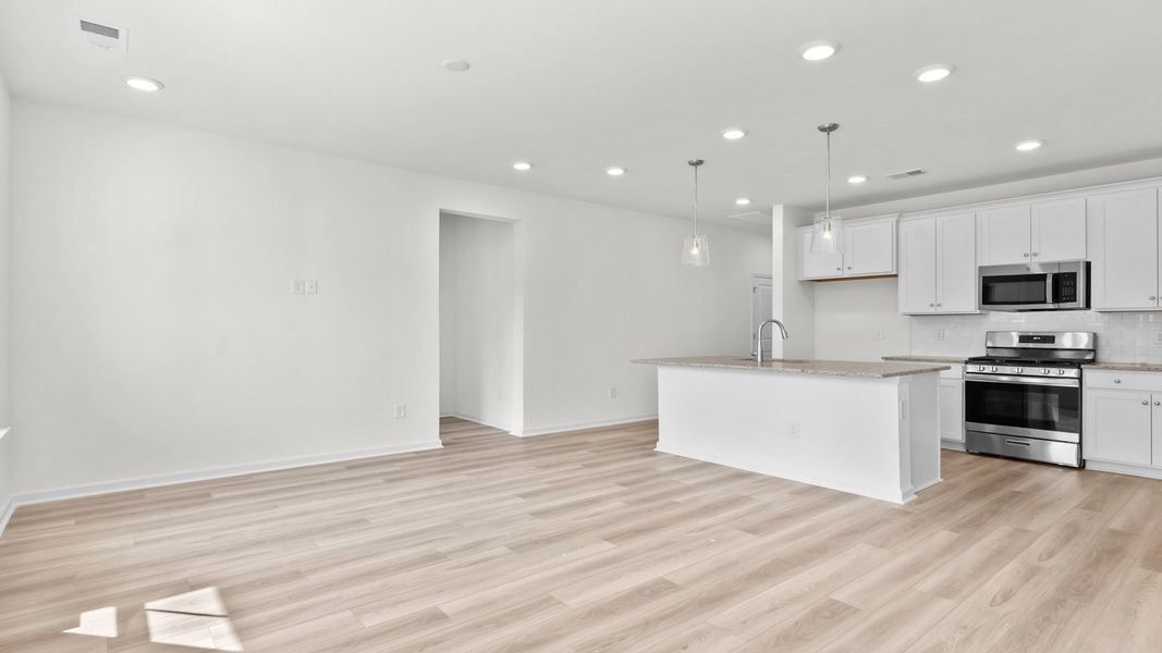 Representative furnished interior of a home built from the Boynton III by DRB Homes in Chestnut Farms, Longs (Image 9).