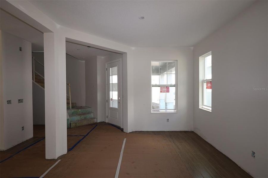 In-progress construction of a new home in Eden at Crossprairie, St. Cloud, FL (Image 20).