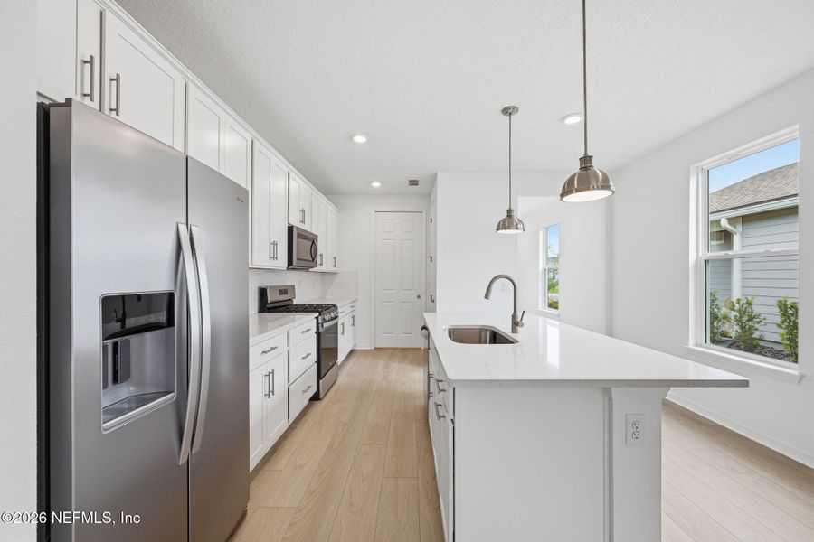 Furnished interior view inside a new home in Del Webb Wildlight, Yulee (Image 6).