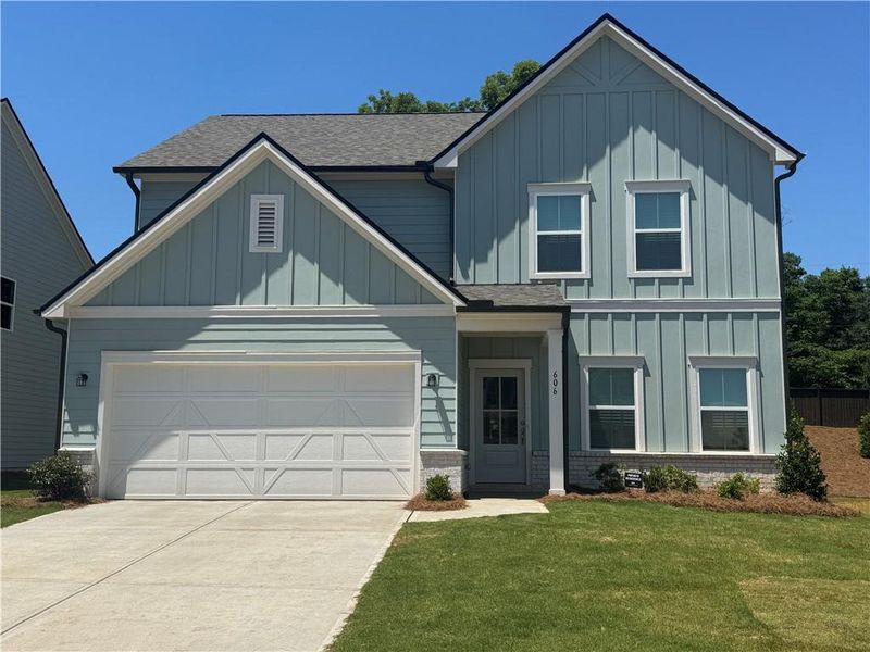 Front exterior of a new home in Langston Reserve, Cartersville, GA, highlighting curb appeal (Image 1). Front exterior of a new home in Langston Reserve, Cartersville, GA, highlighting curb appeal (Image 1).