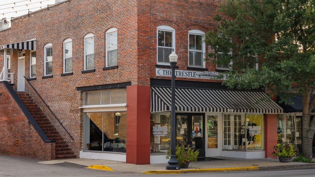 Front exterior of a new home in Pinewood Estates, Conway, SC, highlighting curb appeal (Image 11).