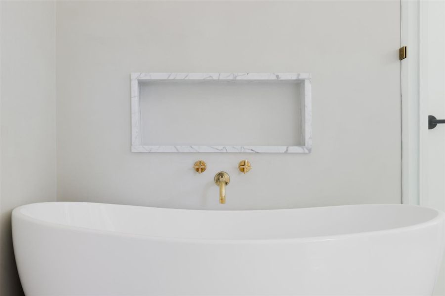 Perfect for a long, luxurious bath, this soaking tub transforms the beautiful primary bathroom into a personal spa retreat.