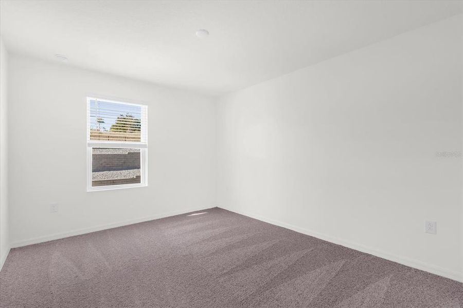 Spacious, unfurnished interior of a new home in Bellaviva III at Westside, Davenport (Image 13).