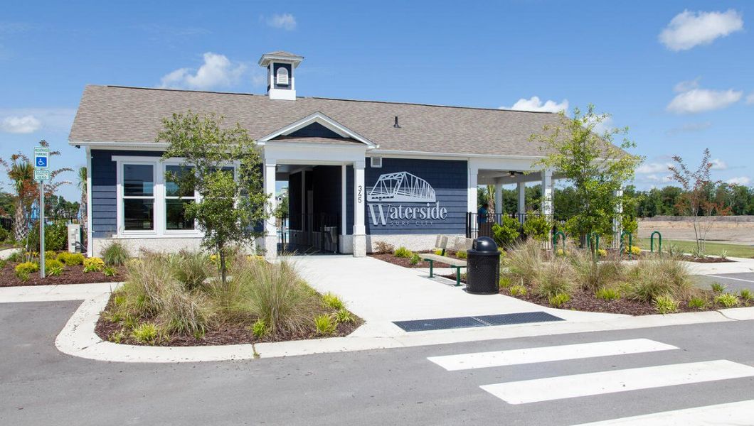 Front exterior of a new home in Waterside Townhomes, Surf City, NC, highlighting curb appeal (Image 20).