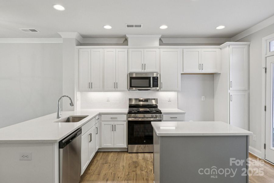 Furnished interior view inside a new home in , Huntersville (Image 7).