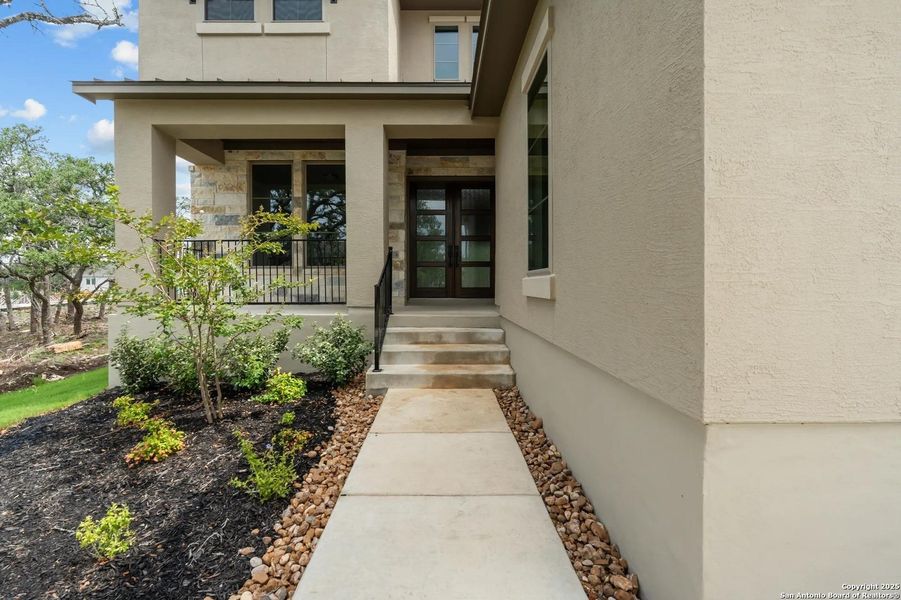 Exterior details and patio area of a home in Esperanza - 80' & 90', Boerne (Image 15). Exterior details and patio area of a home in Esperanza - 80' & 90', Boerne (Image 15).