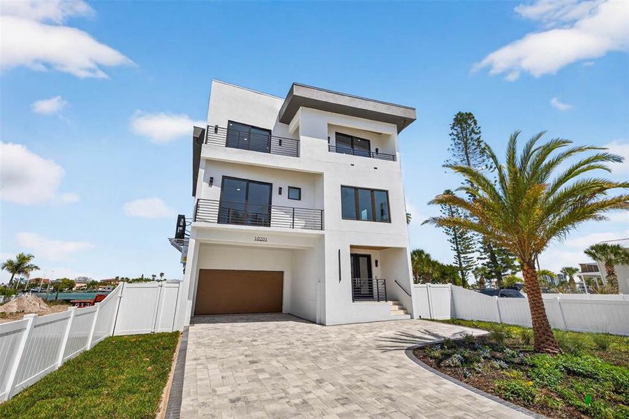 Front exterior of a new home in , Treasure Island, FL, highlighting curb appeal (Image 29).