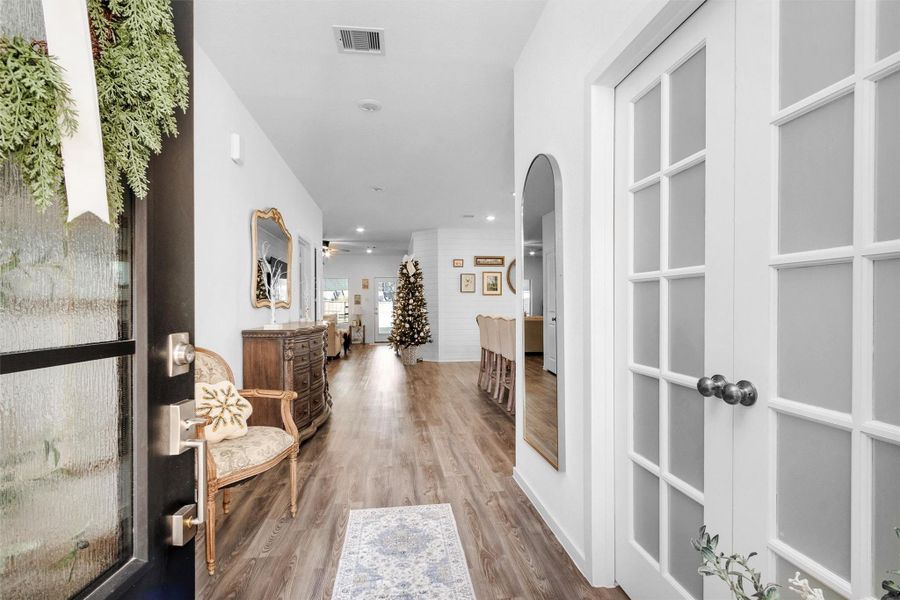 Home office with double French doors to the right