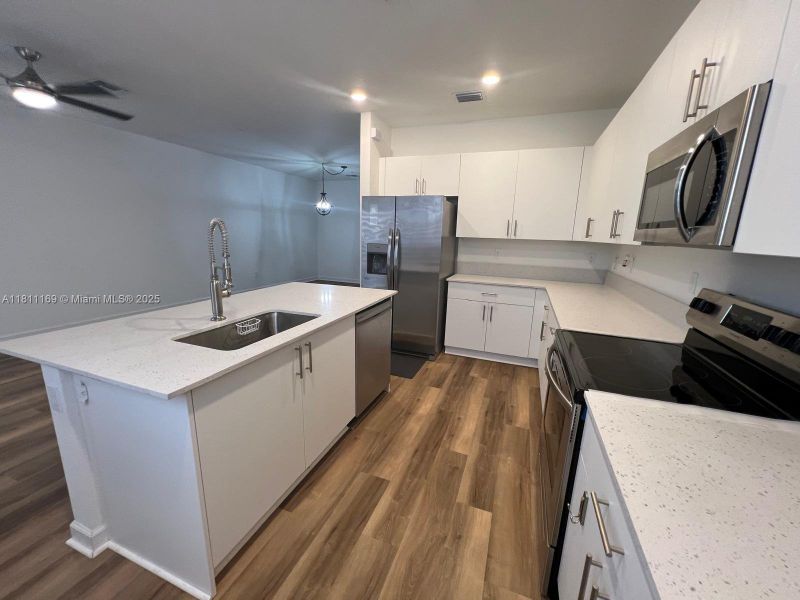 Furnished interior view inside a new home in , Pembroke Pines (Image 9).