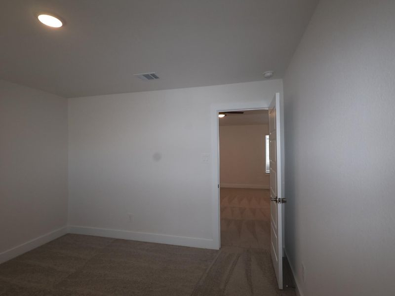 Spacious, unfurnished interior of a new home in Sorella, Tomball (Image 22).