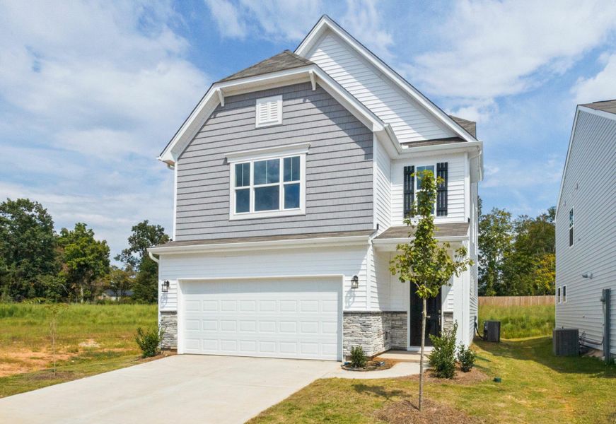 Front exterior of a new home in Bellevue, Greenville, SC, highlighting curb appeal (Image 2).