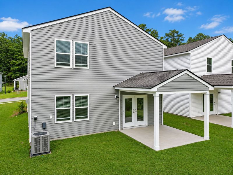 Exterior details and patio area of a home in Grand Arbor, Blythewood (Image 3).
