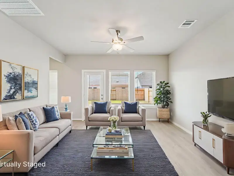 Furnished interior view inside a new home in Massey Oaks Village, Pearland (Image 4). Furnished interior view inside a new home in Massey Oaks Village, Pearland (Image 4).