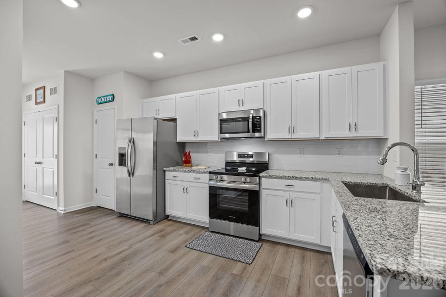 Furnished interior view inside a new home in Country Club Village, Salisbury (Image 14).