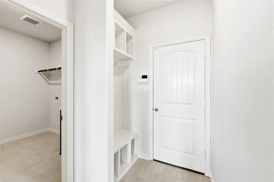 Mudroom with baseboards