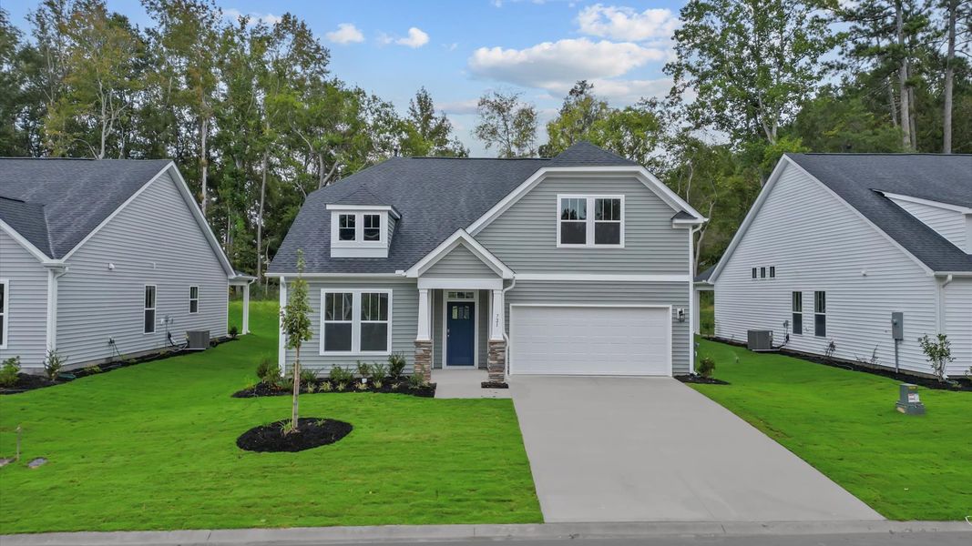First-rate curb appeal with clean lines and a welcoming front entry