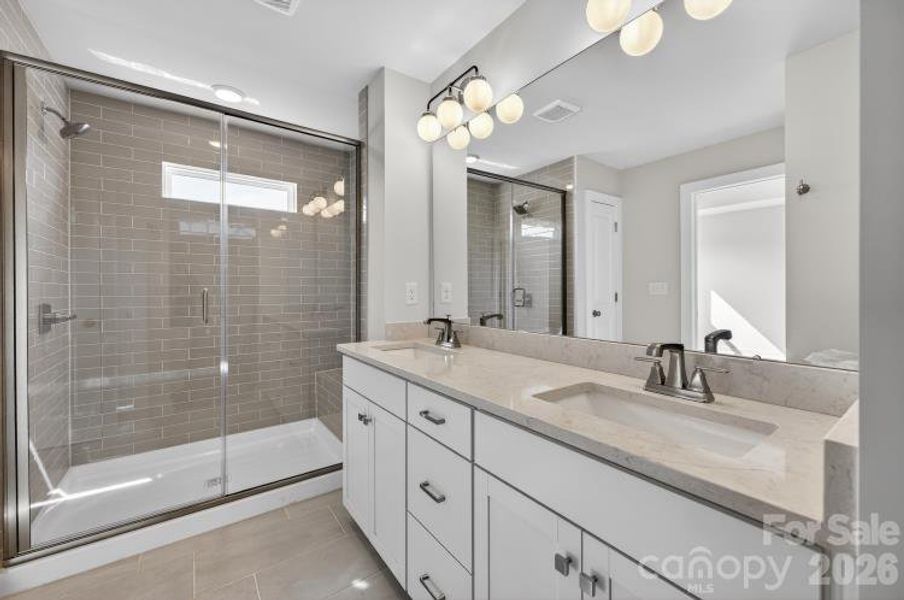 Furnished interior view inside a new home in North Creek Village - Townhomes, Huntersville (Image 5).