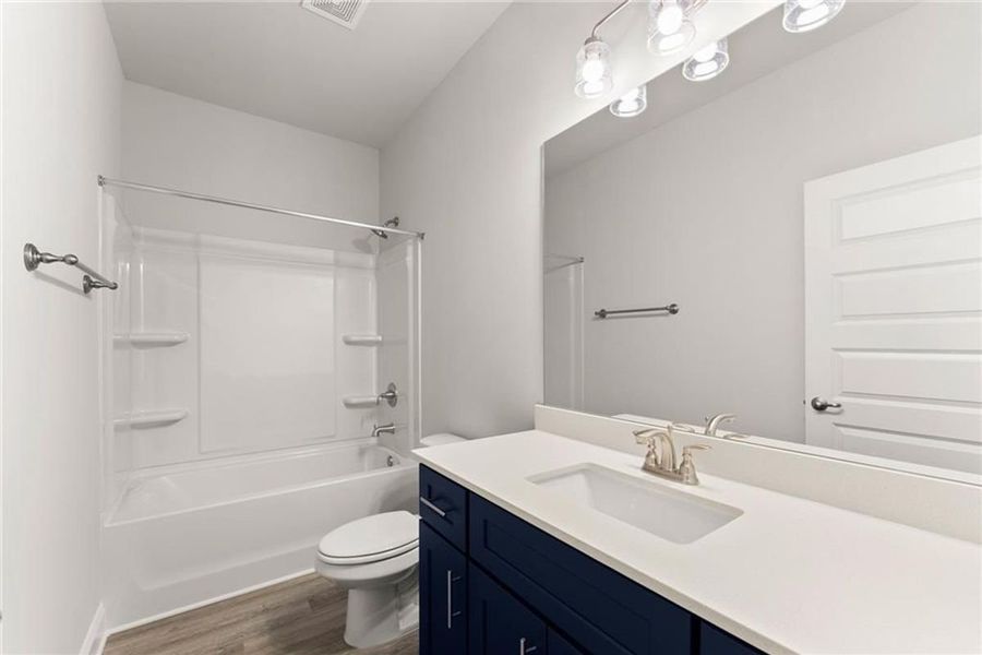 Representative furnished interior of a home built from the 2620 by Adams Homes in Williams Ridge, Bailey (Image 13). Representative furnished interior of a home built from the 2620 by Adams Homes in Williams Ridge, Bailey (Image 13).